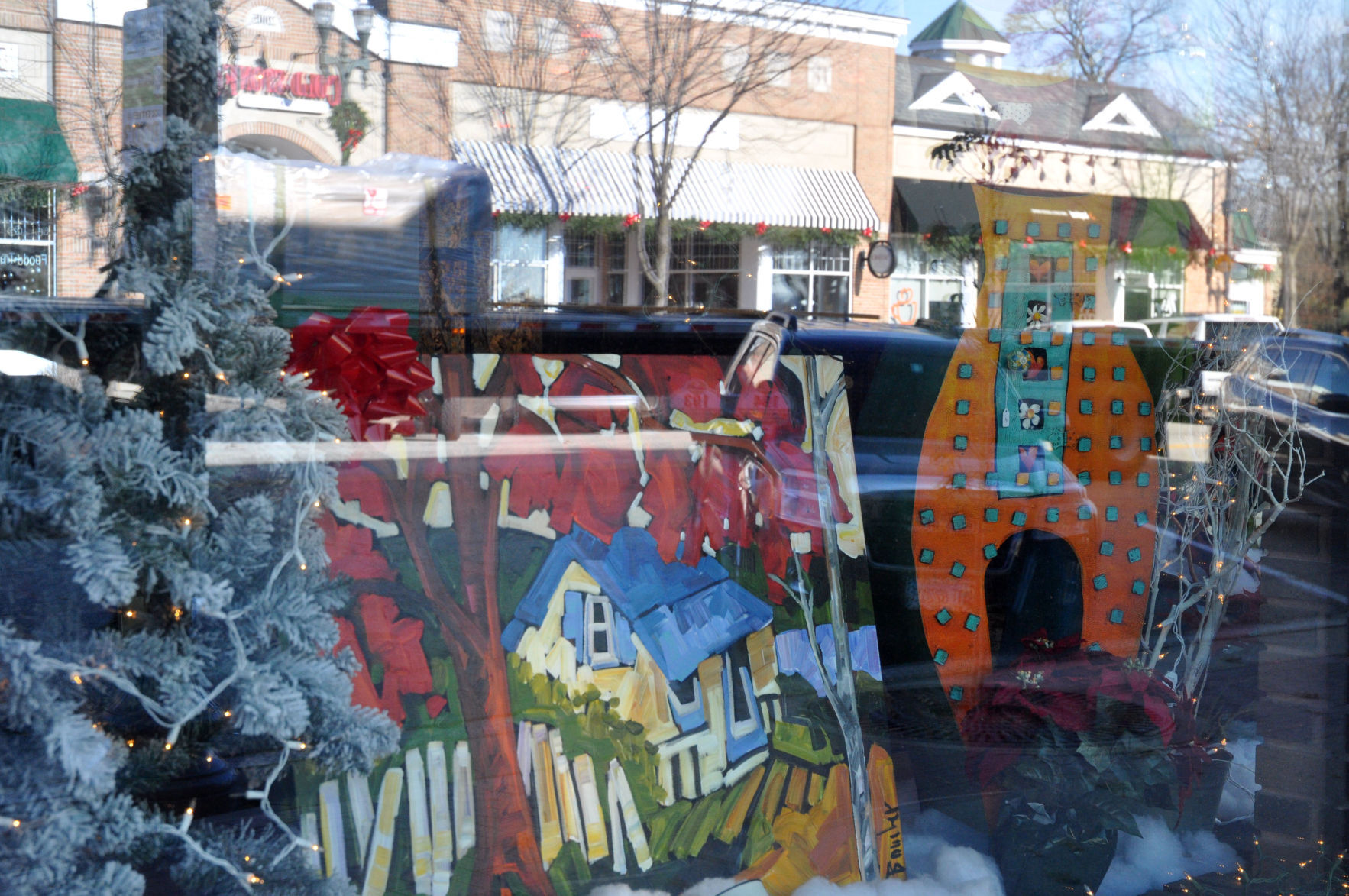 Galerie Matisse, 830 Main St., got artistic with its window display this year with a Christmas and large cardboard holiday decorations